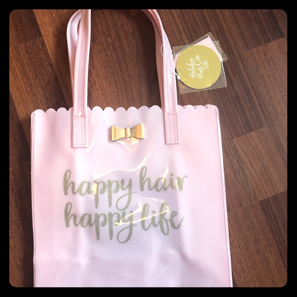 Light pink with gold writing small bag